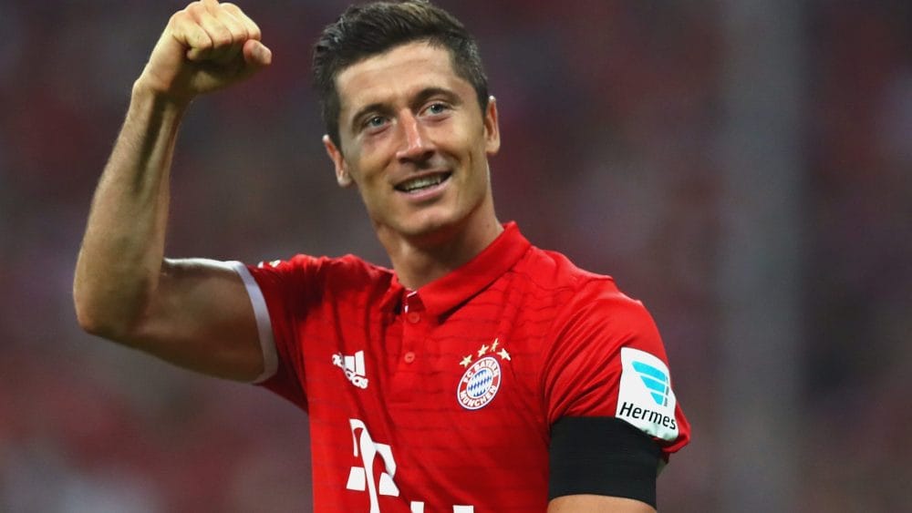 MUNICH, GERMANY - AUGUST 26: Robert Lewandowski of Bayern Muenchen celebrates scoring the 3rd team goal during the Bundesliga match between Bayern Muenchen and Werder Bremen at Allianz Arena on August 26, 2016 in Munich, Germany. (Photo by Alexander Hassenstein/Bongarts/Getty Images)