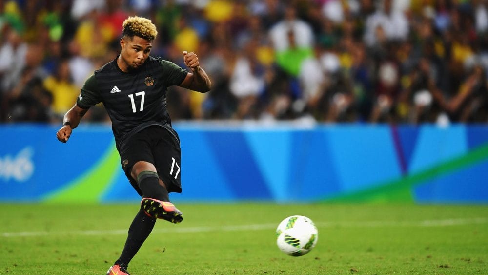 RIO DE JANEIRO, BRAZIL - AUGUST 20: Serge Gnabry of Germany takes his penalty in the shoot out during the Men's Football Final between Brazil and Germany at the Maracana Stadium on Day 15 of the Rio 2016 Olympic Games on August 20, 2016 in Rio de Janeiro, Brazil. (Photo by Laurence Griffiths/Getty Images)