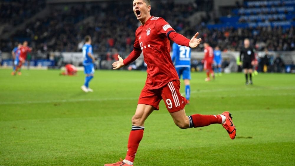 SINSHEIM, GERMANY - JANUARY 18: Robert Lewandowski of Bayern Munich celebrates scoring the 3rd Bayern Munich goal during the Bundesliga match between TSG 1899 Hoffenheim and FC Bayern Muenchen at Wirsol Rhein-Neckar-Arena on January 18, 2019 in Sinsheim, Germany. (Photo by Matthias Hangst/Bongarts/Getty Images)