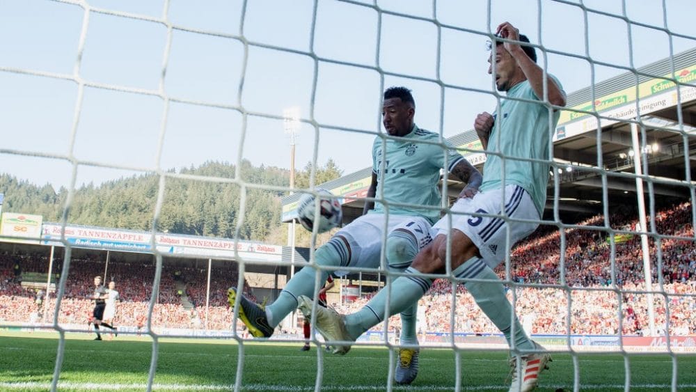 FREIBURG IM BREISGAU, GERMANY - MARCH 30: Jerome Boateng of FC Bayern Muenchen and Mats Hummels of FC Bayern Muenchen save a ball on the line during the Bundesliga match between Sport-Club Freiburg and FC Bayern Muenchen at Schwarzwald-Stadion on March 30, 2019 in Freiburg im Breisgau, Germany. (Photo by Matthias Hangst/Bongarts/Getty Images)