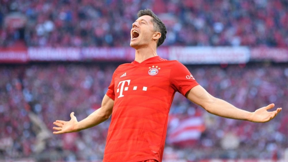 MUNICH, GERMANY - OCTOBER 26: Robert Lewandowski of FC Bayern Munich celebrates after scoring his team's second goal during the Bundesliga match between FC Bayern Muenchen and 1. FC Union Berlin at Allianz Arena on October 26, 2019 in Munich, Germany. (Photo by Sebastian Widmann/Bongarts/Getty Images)