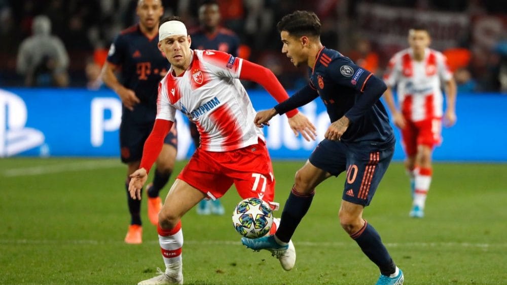 BELGRADE, SERBIA - NOVEMBER 26: Philippe Coutinho of FC Bayern Munich is put under pressure by Mateo Garcia of Crvena Zvezda during the UEFA Champions League group B match between Crvena Zvezda and Bayern Muenchen at Rajko Mitic Stadium on November 26, 2019 in Belgrade, Serbia. (Photo by Srdjan Stevanovic/Getty Images)