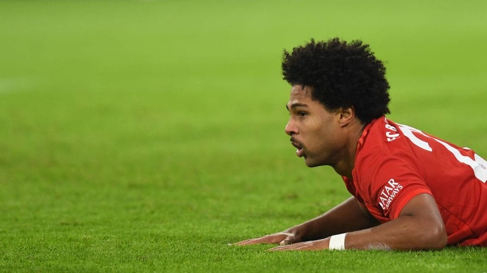 Bayern Munich's midfielder Serge Gnabry reacts at the field during the German first division Bundesliga match between FC Bayern Munich and Borussia Dortmund in the stadium in Munich, southern Germany, on November 9, 2019.