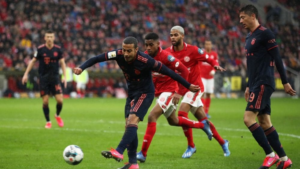 Thiago Alcántara of FC Bayern Muenchen scores his sides third goal during the Bundesliga match between 1. FSV Mainz 05 and FC Bayern Muenchen at Opel Arena on February 01, 2020 in Mainz, Germany. (Photo by Alex Grimm/Bongarts/Getty Images)