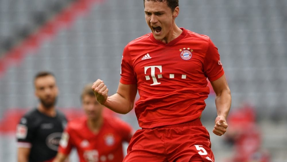 MUNICH, GERMANY - MAY 30: Benjamin Pavard of Bayern Munich celebrates after scoring his team's second goal during the Bundesliga match between FC Bayern Muenchen and Fortuna Duesseldorf at Allianz Arena on May 30, 2020 in Munich, Germany. (Photo by Christof Stache/Pool via Getty Images)